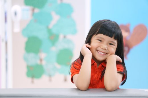 Small child smiling at camera